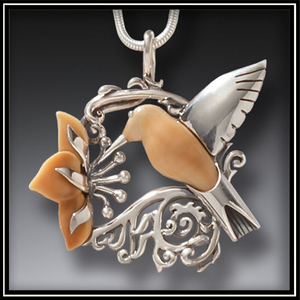 Fossilized Walrus Ivory And Silver Hummingbird Spring Pendant
