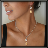 Mammoth Ivory Arctic Rain Blue Topaz Teardrop Earrings
