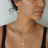 Night Rain Fossilized Mammoth Ivory and Rainbow Moonstone Pendant