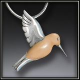 Fossilized Walrus Ivory and Silver Hummingbird Pendant