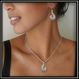 Silver and Blue Topaz Ocean Wave Pendant