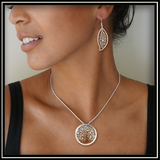 Tree of Life Fossilized Walrus Ivory and Rainbow Moonstone Pendant