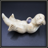 Otter Rocking with Shell