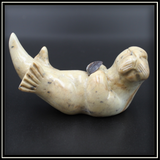 Otter Rocking with Shell